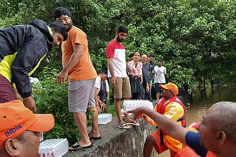 NDRF personnel during a relief operation in Navsari